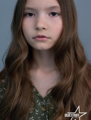 Мелания Била